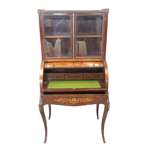 493 - 19th century Rosewood cylinder bureau cabinet, the metal gallery top above two glazed doors, the int... 