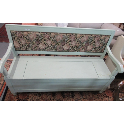 578 - Painted pine settle with tapestry back, open arms and hinged box seat.
(B.P. 21% + VAT)