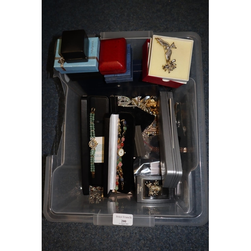 200 - Plastic box of assorted costume jewellery: dress watches with coloured stones, costume brooches, sim... 