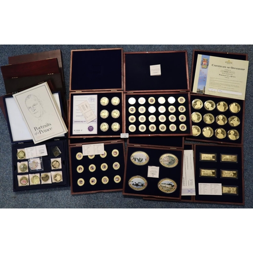 210 - Collection of various cased GB crowns, all in gold plated copper with other odd coins and a set 'Por... 