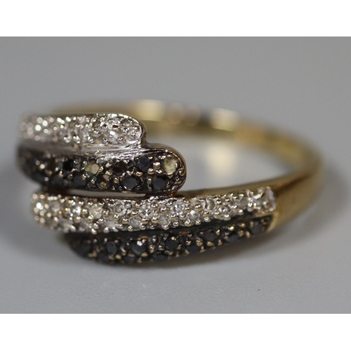 228 - 9ct gold four band  diamond and stone set snake ring.  2.5g approx. size O.  (B.P. 21% + VAT)