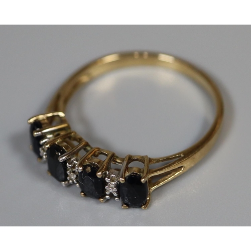 229 - 9ct gold 4 stone claw setting dress ring 2g approx. size N.  (B.P. 21% + VAT)