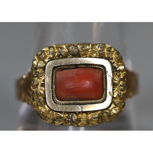 231 - Victorian coral set unmarked gold ring (tests as 9ct) with engraved shank and foliate mount.  Size S... 