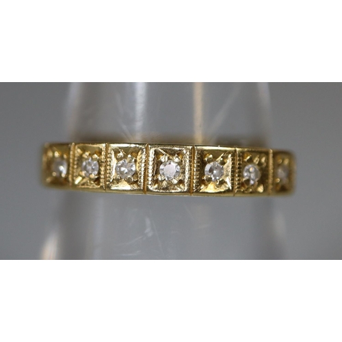 232 - A diamond half eternity style ring set in 18ct gold.  Ring size M & 1/2.  Approx. weight 2.7 grams.
... 