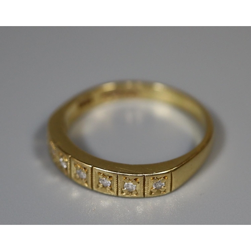 232 - A diamond half eternity style ring set in 18ct gold.  Ring size M & 1/2.  Approx. weight 2.7 grams.
... 