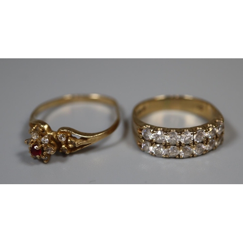 233 - Two 9ct gold stone set dress rings.  4.5g approx.  
(B.P. 21% + VAT)