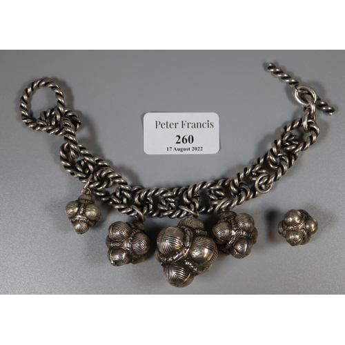 260 - White metal chain bracelet with pendant baubles.  (B.P. 21% + VAT)