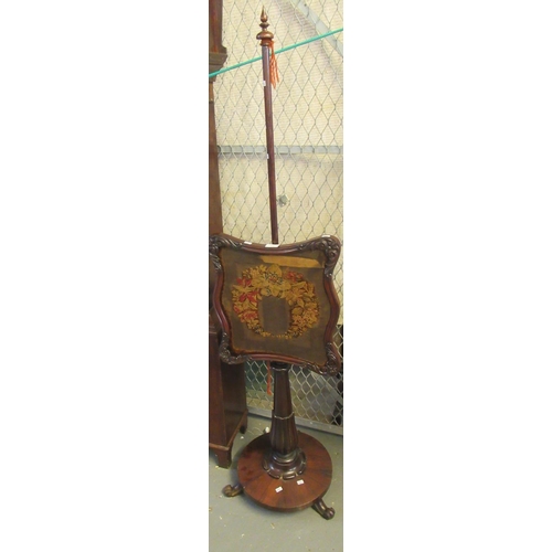 438 - 19th century rosewood pole or makeup screen, having tapestry banner.  (B.P. 21% + VAT)