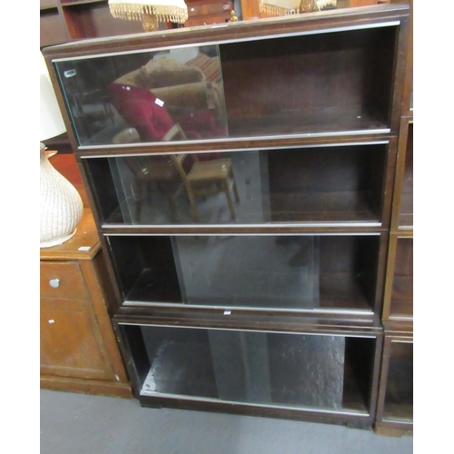 464 - Minty Oxford mahogany four section library bookcase with glass sliding doors.  (B.P. 21% + VAT)