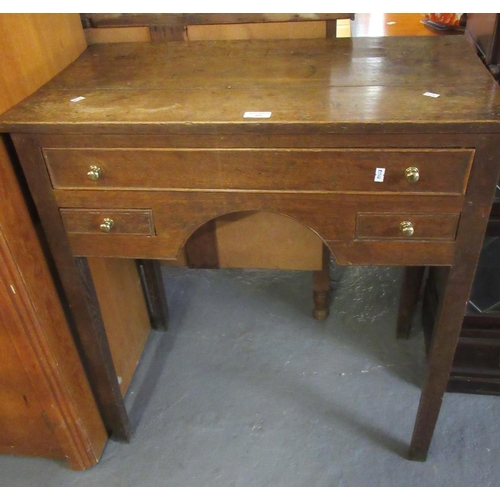 469 - 19th century oak lowboy, the moulded top above one long and two small drawers with arched centre sta... 