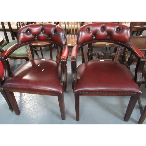 477 - Pair of ox blood leather button back club type mahogany armchairs on square tapering legs (2)  (B.P.... 