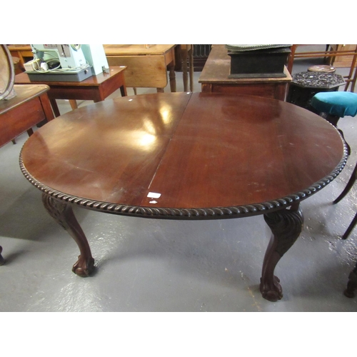 497 - Victorian mahogany extending dining table with one additional leaf, standing on cabriole legs and ba... 