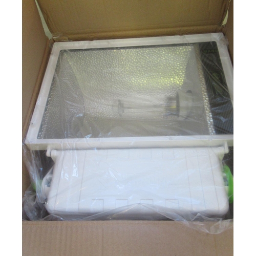 558 - Modern 'Mars 1' floodlight, together with a 'Mac 5' floodlight, both in boxes.  (B.P. 21% + VAT)