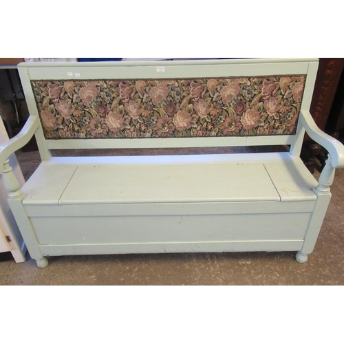 578 - Painted pine settle with tapestry back, open arms and hinged box seat.
(B.P. 21% + VAT)