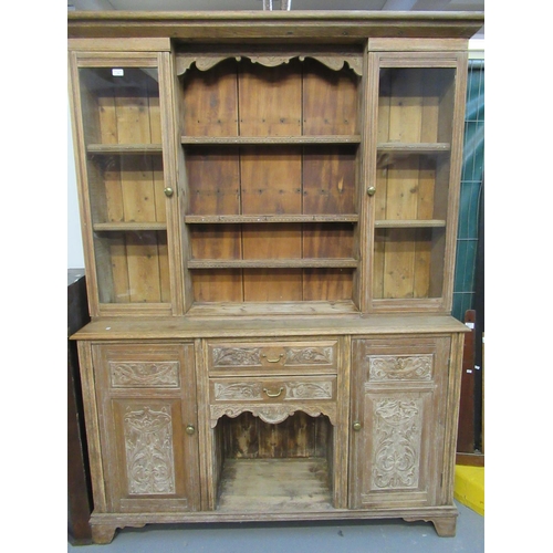 596 - Late 19th early 20th century pale oak cabinet back dog kennel dresser with relief floral and foliate... 