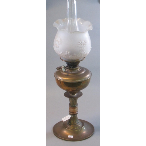 67 - Early 20th century double oil burner lamp with frosted glass shade on a brass reservoir and base.  (... 