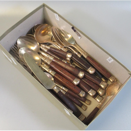 89 - Box of hardwood handled cutlery: knives, forks, spoons, teaspoons and small sauce ladle. 
(B.P. 21% ... 