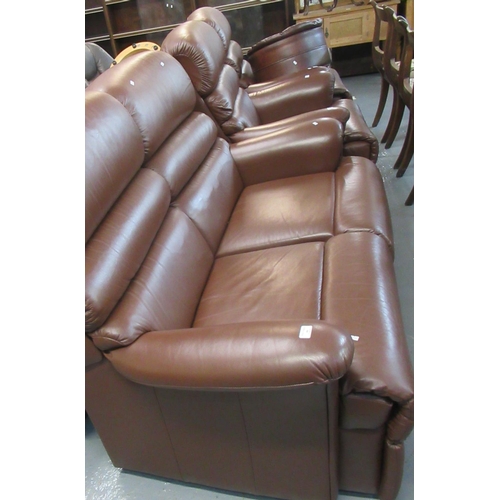 502 - Modern brown leather three piece suite comprising two seater sofa and a pair of armchairs together w... 