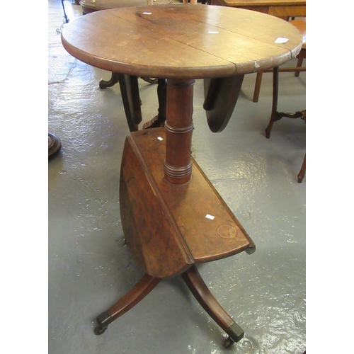 508 - 19th century mahogany pedestel two tier Dumb Waiter of circular rotating form with drop leaf under t... 