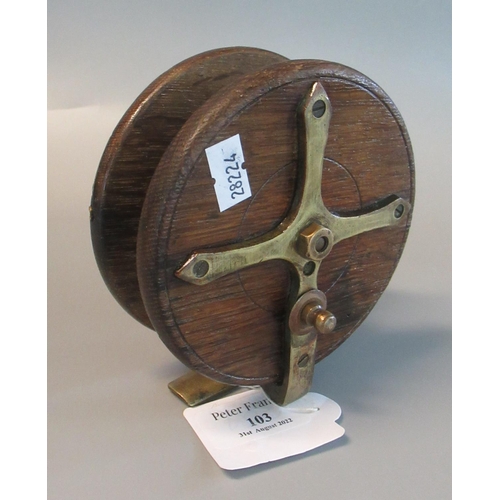 103 - Mahogany star backed brass mounted sea or pike fishing centre pin reel with horn handles.   (B.P. 21... 