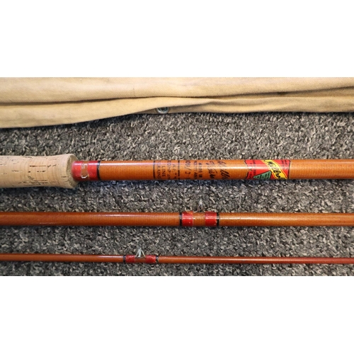 127 - 'Milbrolite' three piece glass fibre coarse fishing rod.  11ft.  Canvas case.  (B.P. 21% + VAT)