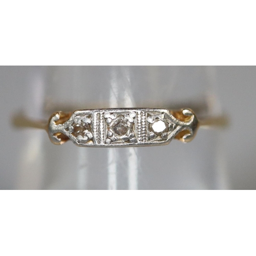 273 - 18ct gold Art Deco design three stone diamond dress ring.  1.5g. approx.  size O.   (B.P. 21% + VAT)