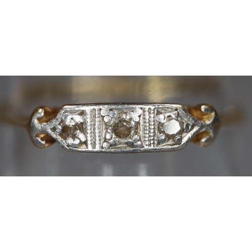 273 - 18ct gold Art Deco design three stone diamond dress ring.  1.5g. approx.  size O.   (B.P. 21% + VAT)