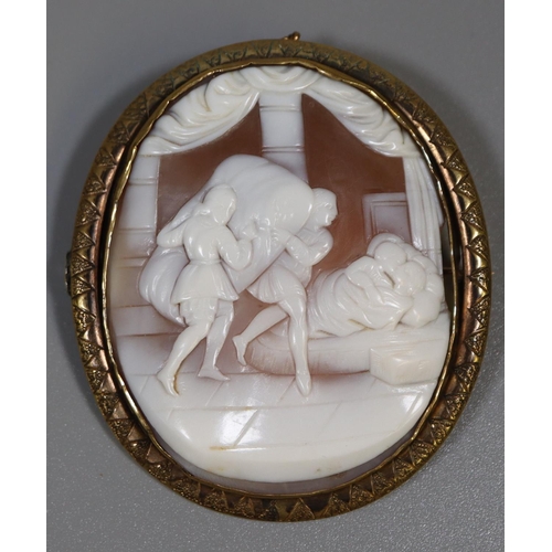 287 - Victorian carved shell cameo brooch, theatrical scene, figures in an interior, within gilt metal fra... 