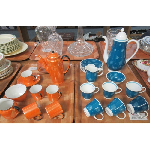 334 - Two coffee sets on two trays; one Susie Cooper English bone china set on blue ground and a Noritake ... 