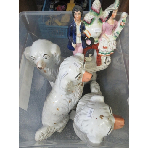 342 - Box containing three Staffordshire fireside spaniels and a Staffordshire style flatback figure of a ... 