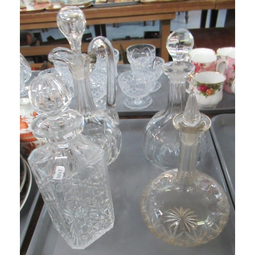 360 - Tray of glassware to include; three decanters and stoppers and one ewer with stopper, moulded and cu... 