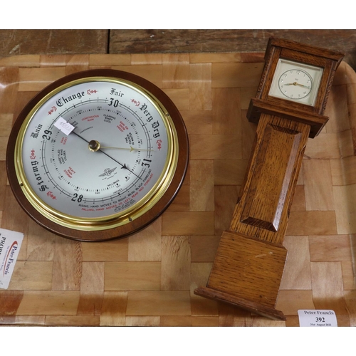 392 - A Smith's Empire miniature replica Grandfather clock in an oak case and a circular Shortland baromet... 