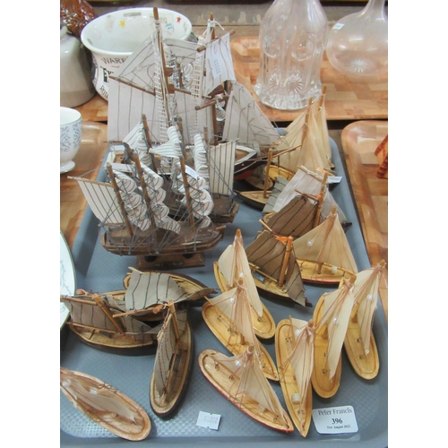 396 - Collection of model wooden sailing ships and clippers with cloth sails. (25)
(B.P. 21% + VAT)