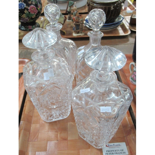 412 - Tray with two pairs of cut glass decanters, square shaped, two with mushroom stoppers, two with roun... 