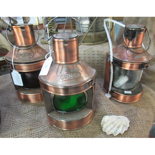 428 - Three copper ship's lanterns: 'Port', 'Starboard' and 'Masthead'.  (3)  (B.P. 21% + VAT)