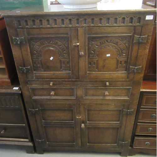 457 - Reproduction 17th century style oak cupboard with two arcade moulded panel doors, two drawers above ... 