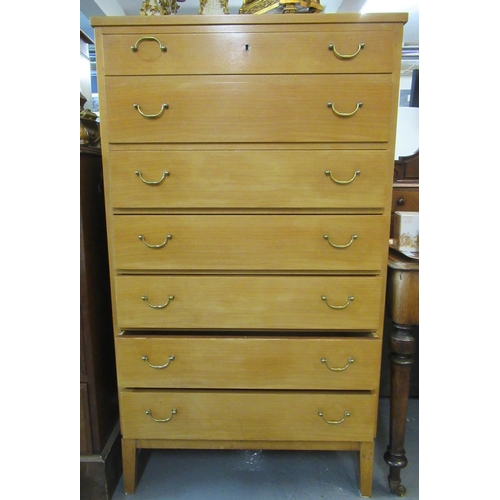 465 - Mid century beech tall chest of seven drawers on square tapering legs.  75cm wide approx.   (B.P. 21... 