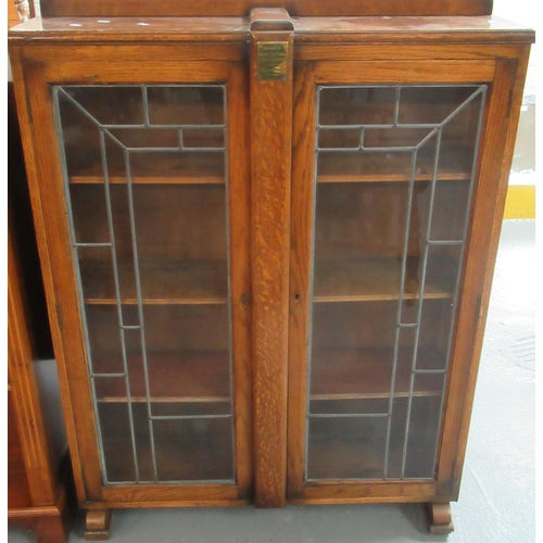 468 - Early 20th century oak presentation two door bookcase with lead glazed doors.  92cm wide approx.   (... 