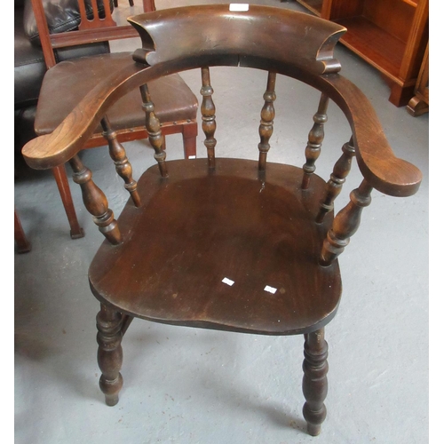 487 - Early 20th century stained oak smokers bow armchair.  
(B.P. 21% + VAT)