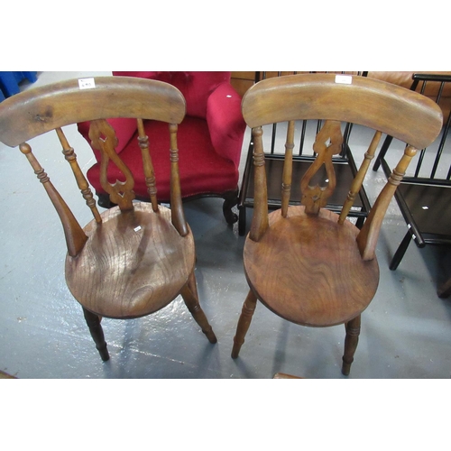 490 - Pair of early 20th century beech and ash splat backed kitchen chairs with circular seats.  (2)   (B.... 