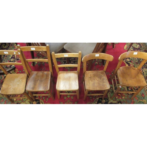 513 - A group of five mid 20th century child's beech and elm school room chairs.  (5)  (B.P. 21% + VAT)