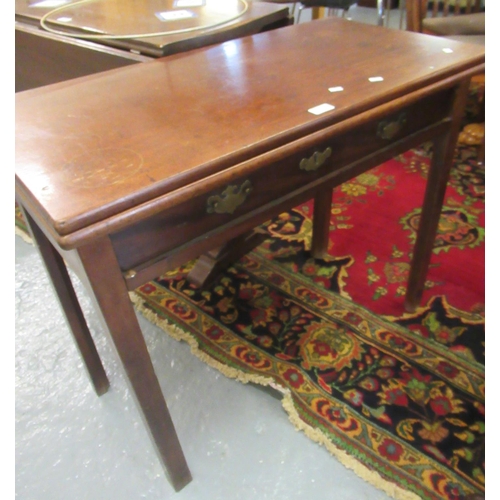 518 - 18th century mahogany fold over tea or supper table with single frieze drawer on square legs.  88cm ... 