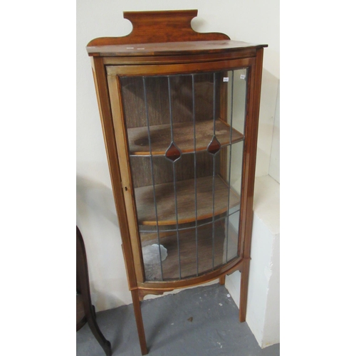 528 - Edwardian mahogany single  bow fronted china cabinet with lead glazed door and two shelves to the in... 