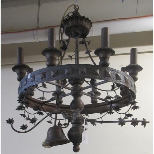 531 - Oxidised metal chandelier in 17th century style.  with flower head decoration.  (B.P. 21% + VAT)