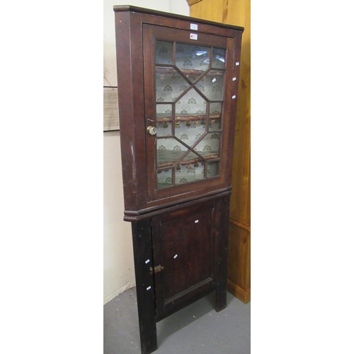 540 - 19th century oak astragal glazed corner cabinet, the interior revealing three shaped shelves.  (B.P.... 