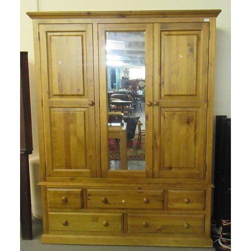 541 - Modern natural pine three section mirror centre wardrobe with an arrangement of five drawers below. ... 