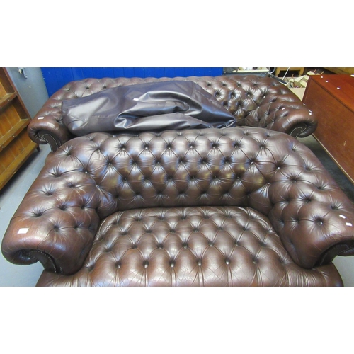 545 - Modern deep buttoned leather four seater Chesterfield type sofa, together with another similar two s... 