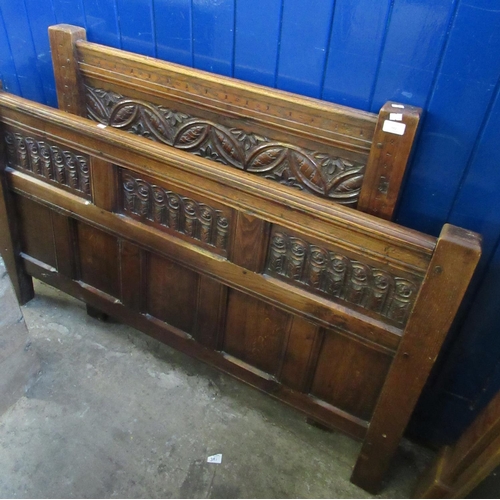 552 - Two reproduction 17th century style oak bedheads.  91cm and 1.35m approx.  (2)  (B.P. 21% + VAT)