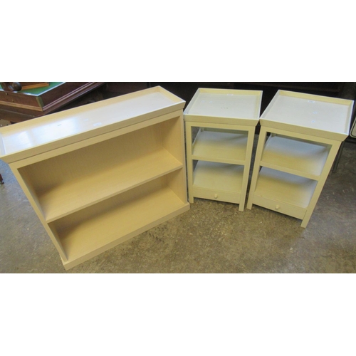 570 - Modern Ivory finish open book case and two bedside open shelves.  (3)  (B.P. 21% + VAT)