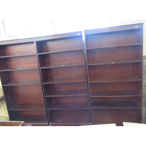 571 - Set of three modern mahogany free standing open book cases.  (3)  (B.P. 21% + VAT)